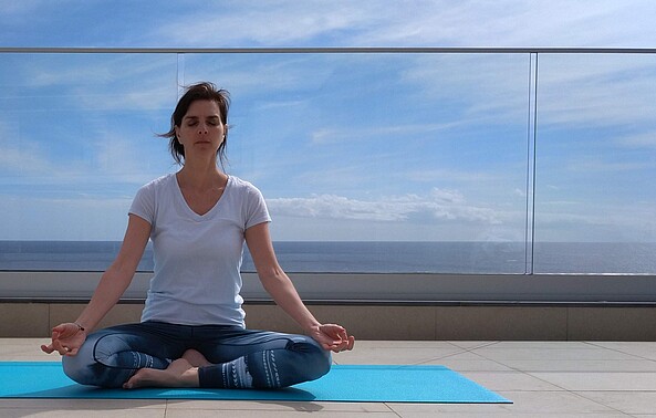 Yoga practice  with sea views at Alpino Hotel offered by SIS Wellness Holidays